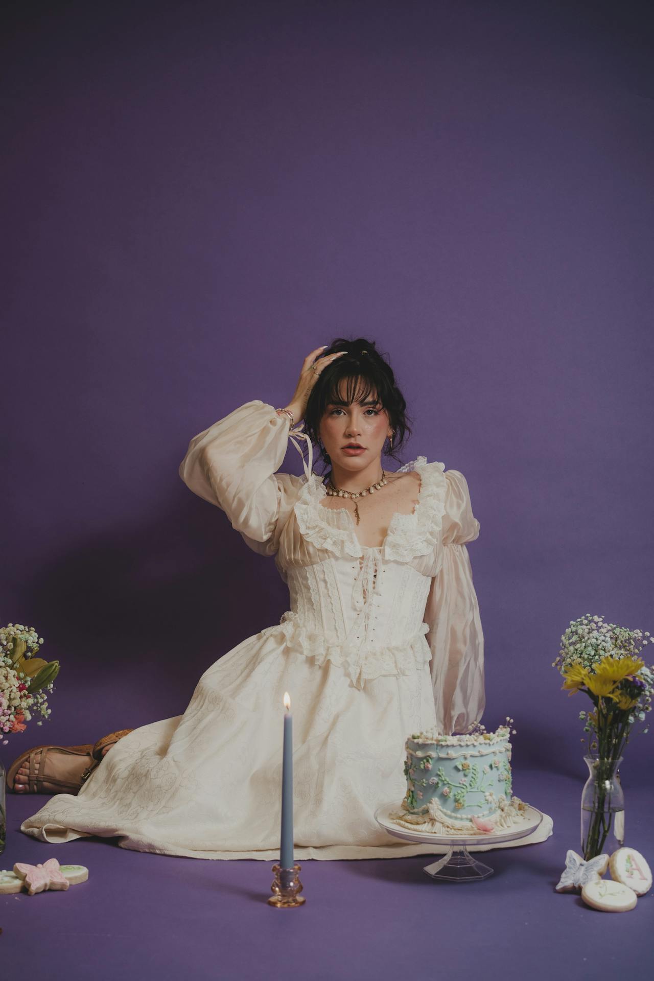 Elegant birthday party table setting with pastel decorations